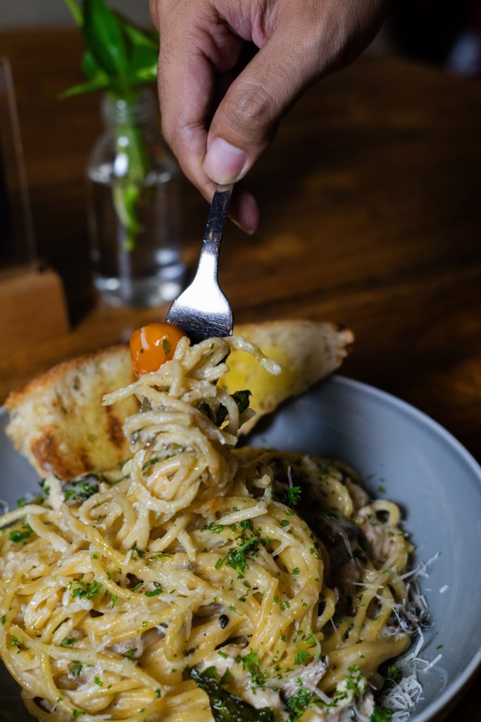 Creamy pasta served at Camino Bali