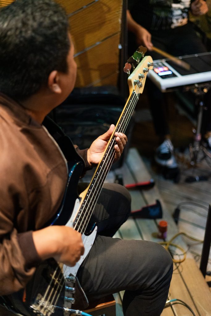 Bass player during live music night at Camino Bali